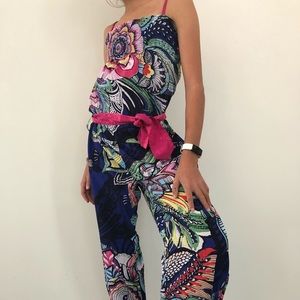Colourful Jumpsuit with a pink tie